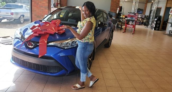 Happy client with their new vehicle